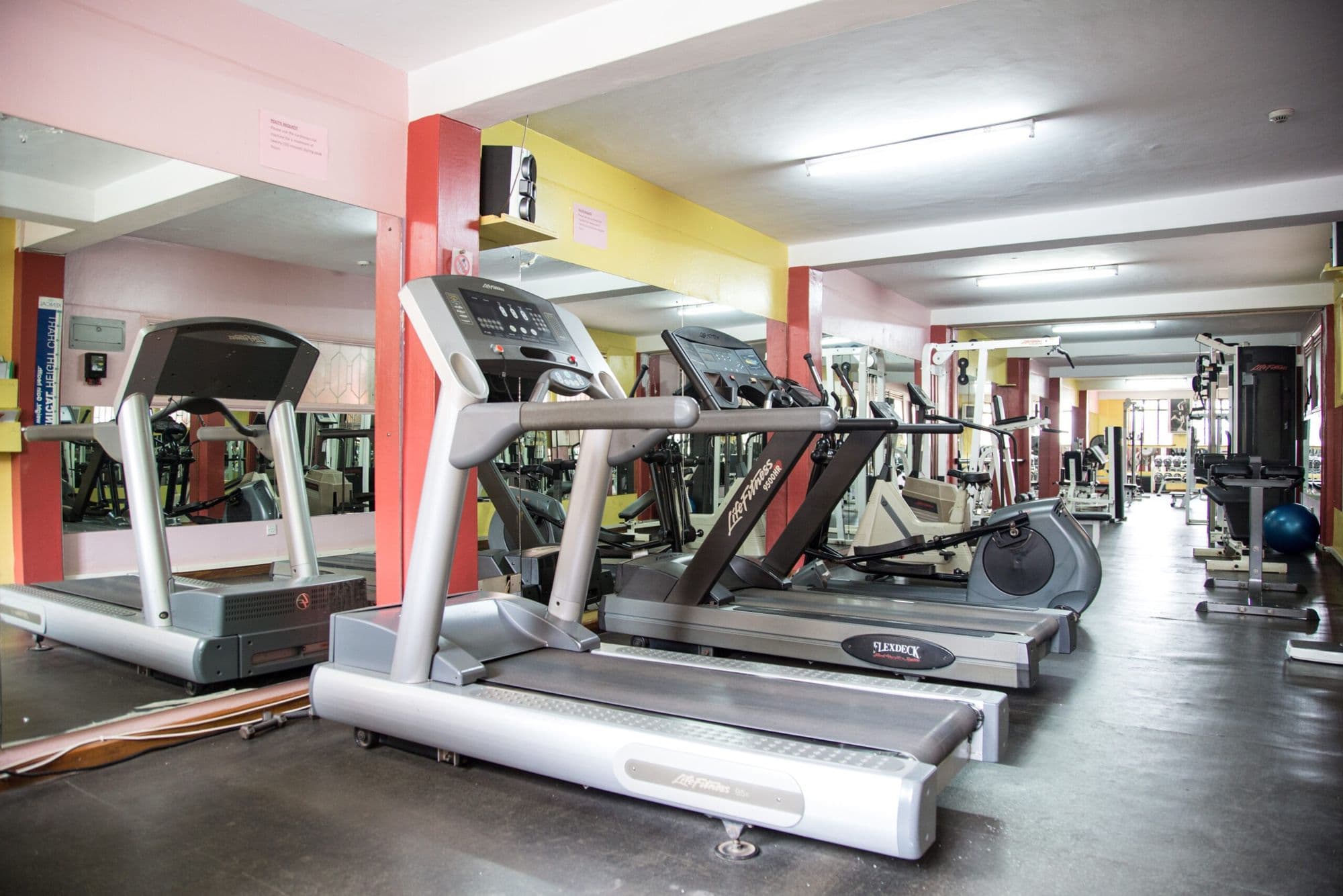 The Njema Court gym with treadmills, cross-trainers and mirrored walls